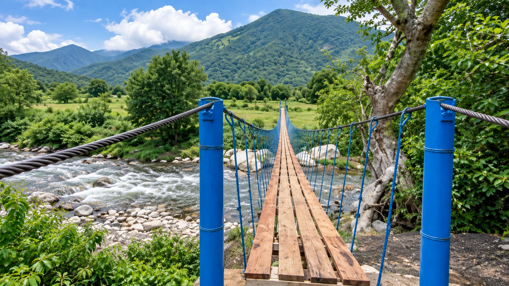 Community bridge in a mountainous landscape