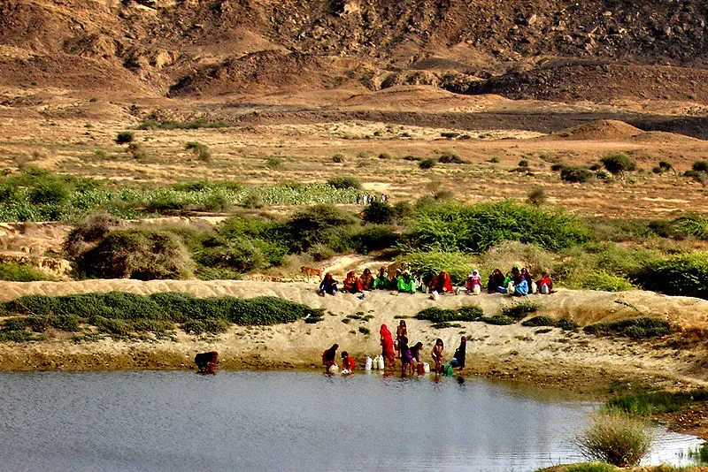 Women gathering beside water in Sindh